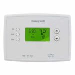Honeywell 5 2-day programmable thermostat with black digital digits on green screen