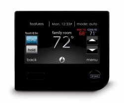 bryant smart thermostat with black background and multi-colored numbers and letters