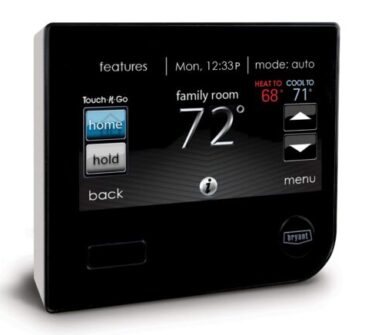 smart thermostat black with white digital numbers